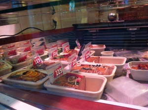 A variety of pates at the meat market.